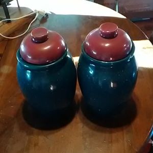 2 green and red cookie jars